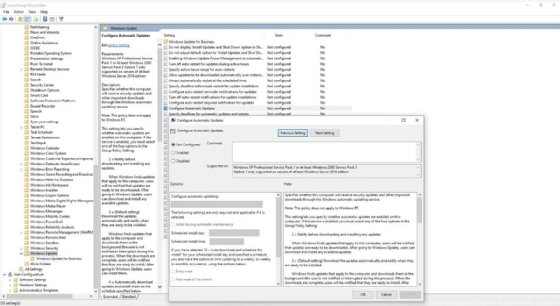 The Configure Automatic Updates window in the Group Policy Editor.