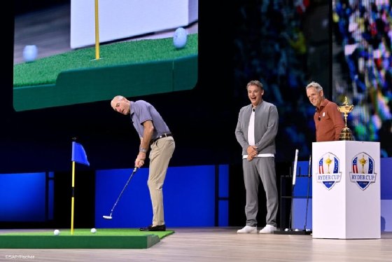 Photo of SAP CEO Christian Klein at SAP Sapphire 2025 with pro golf's Ryder Cup captains
